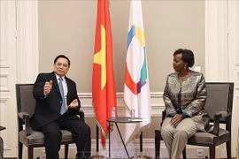 政府总理范明政会见法语国家及地区国际组织秘书长