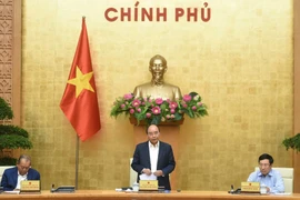 政府总理阮春福：继续实施双重目标