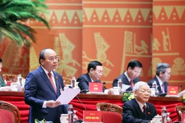 越共十三大：参会代表就提交大会的文件草案深入交换意见