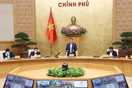 政府总理范明政：力争到今年底完成18岁以上人群全程疫苗接种工作