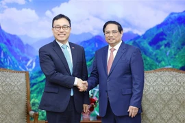 越南政府总理范明政会见韩国和老挝驻越大使