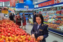 春节渐近 年货消费强盛 多方部署保供稳价促消费
