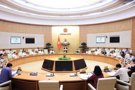 越南政府总理范明政：抓紧出台已生效法律法规的实施细则