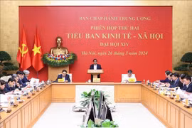 越南政府总理范明政主持召开越共十四大经济社会小组第二次会议