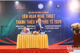 新闻发布会场景。图自人民报