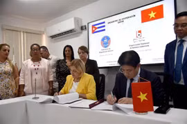 双方签署签署法律事务领域的合作协议。图自越通社