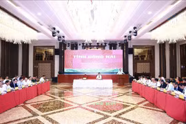 工作会议场景。图自越通社