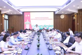 会议场景。图自越通社
