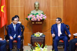 政府总理范明政会见韩国三星(越南)公司总经理崔周湖。图自越通社