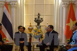 越南政府副总理武德儋会见泰国总理塔纳萨·巴迪玛巴功（图片来源：越通社）