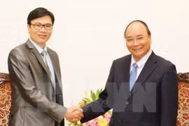 政府总理阮春福会见法国越裔专家与科学协会主席阮德姜（越通社—VNA）