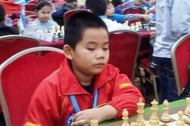 越南棋手邓英明夺男子8岁组别超快棋冠军（图：Vietnamchess）