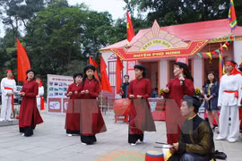 春曲表演活动（图片来源：越通社）