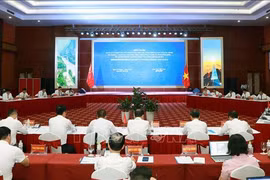 会议场景。图自越通社
