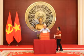 越南驻华大使馆为越南北部受灾群众举行捐款活动。图自越通社