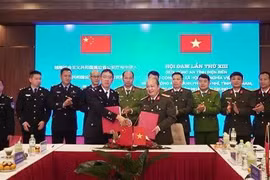 奠边省公安厅与中国云南省普洱市公安局在奠边府市举行第三次年度会谈。图自越通社