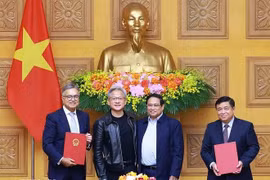 越南政府和NVIDIA签署关于在越南开设人工智能研发中心和人工智能数据中心的合作协议。图自越通社 