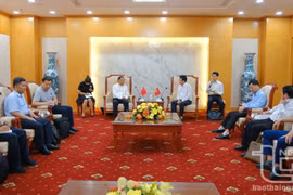 双方会见场景。图自越通社