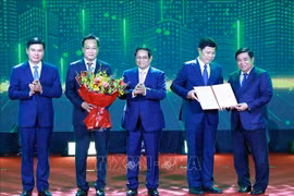 范明政总理出席兴安省《2021-2030年规划和2050年愿景》公布会议。图自越通社