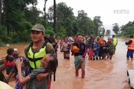 老挝一水电站大坝坍塌 越南领导人为此致慰问电