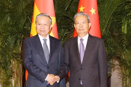 越共中央总书记、国家主席苏林与中国全国人大常委会委员长赵乐际。图自越通社