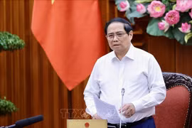 越南政府总理、法律文件制度审查和解决问题指导委员会主任范明政16日主持召开政府常务委员会与各部委工作会议。图自越通社