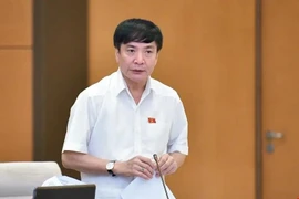 国会投票通过有关免去裴文强的国会秘书长职务的决议。图自VOV