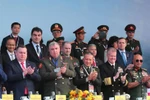 出席2024年越南国际防务展开幕式的各国国防部代表和驻越武官。图自越通社