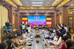 新闻发布会场景。图自越通社