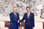 越共中央总书记、国家主席苏林会见中国广西壮族自治区党委书记陈刚 。图自越通社