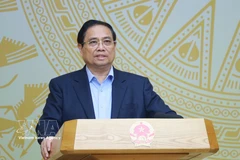 范明政总理发表讲话 图自越通社