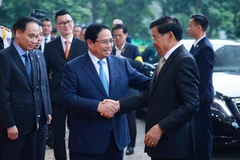 范明政总理会见老挝人民革命党中央总书记、国家主席通伦·西苏里 图自越通社