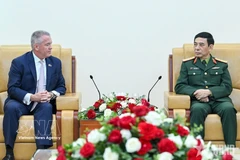 会见场景 图自越通社