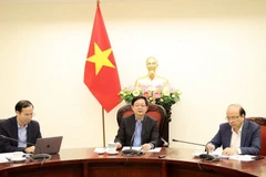 12月25日上午，政府副总理胡国勇主持与司法部的工作会议，听取2025年12月工作计划落实情况及下一阶段重点任务汇报。 图自越通社