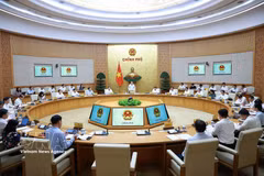 越南政府总理黎明兴主持2026年7月政府法制建设专题会议。图自越通社。