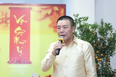 越南驻老挝国防武官潘友胜大校致辞 图自越通社