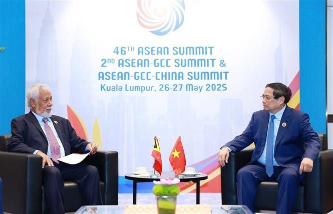 越南政府总理范明政与东帝汶总理古斯芒。图自越通社