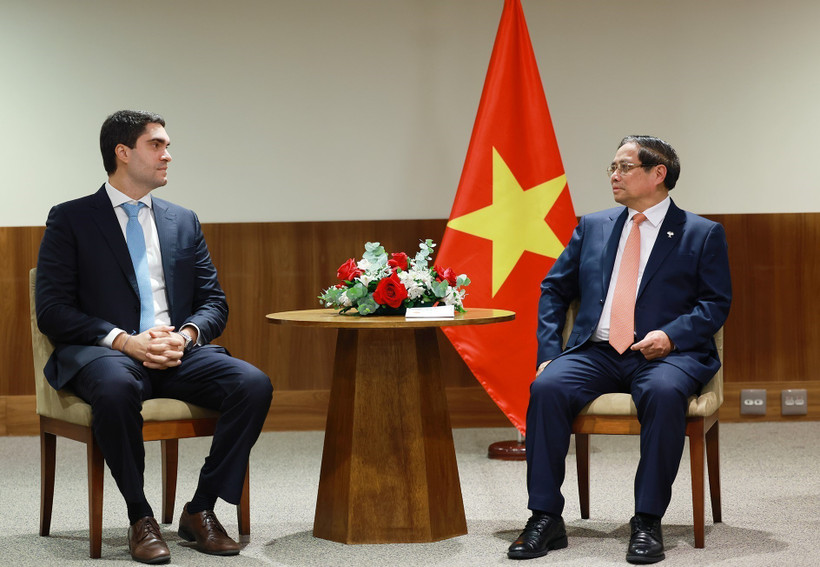 范明政会见巴西淡水河谷公司业务发展总经理丹尼尔·瓜达尔多。图自越通社