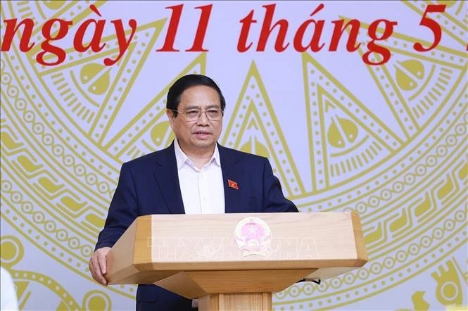 政府总理、全国危旧房清零行动中央指导委员会(以下简称为指导委员会)主任范明政主持召开指导委员会第四次会议。图自越通社