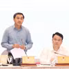 越南卫生部副部长陈文瞬回答记者的提问。图自越通社