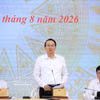 越南财政部副部长阮德芝回答记者提问。图自越通社