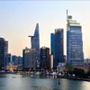 西贡河岸边儿的胡志明市一角。图自越通社