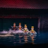 水上木偶戏的背后故事反映越南传统习俗、歌颂农民门的勇气，甚至反映社会的丑恶现象。图自越通社