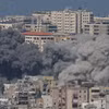 2026年3月4日，以色列空袭黎巴嫩贝鲁特以南的哈雷特·赫雷克后，浓烟升起。图自新华社/越通社