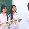 海防市黎青毅坊鸿光高中学生一节使用外语和模型教学的数学课。图自 越通社