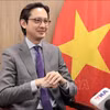 越南常驻联合国代表团团长邓雄越大使在接受越通社记者采访。图自越通社