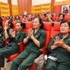 参加纪念大会的代表们。图自越通社
