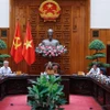 越南政府总理、越南区域与国际金融中心指导委员会主任范明政主持召开指导委员会会议。图自越通社