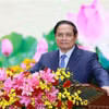 越南政府总理范明政在大会上发表讲话。图自越通社