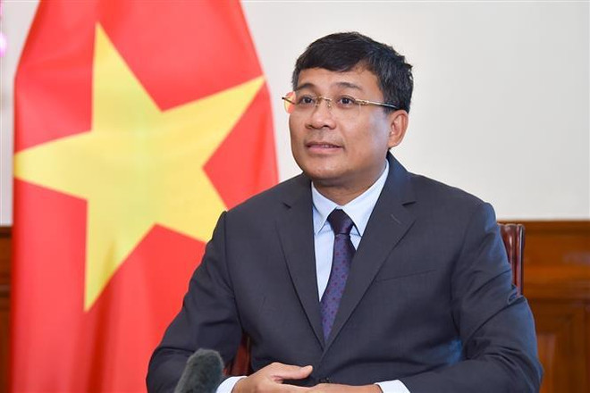 越南外交部常务副部长阮明宇。图自越通社 vna_potal_thu_truong_thuong_truc_bo_ngoai_giao_nguyen_minh_vu_tra_loi_phong_van_truoc_chuyen_tham_han_quoc_cua_thu_tuong_chinh_phu_7456250.jpg